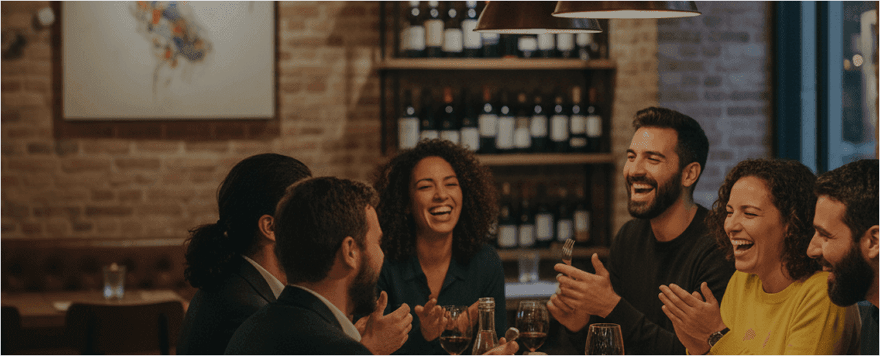 Friends laughing over dinner