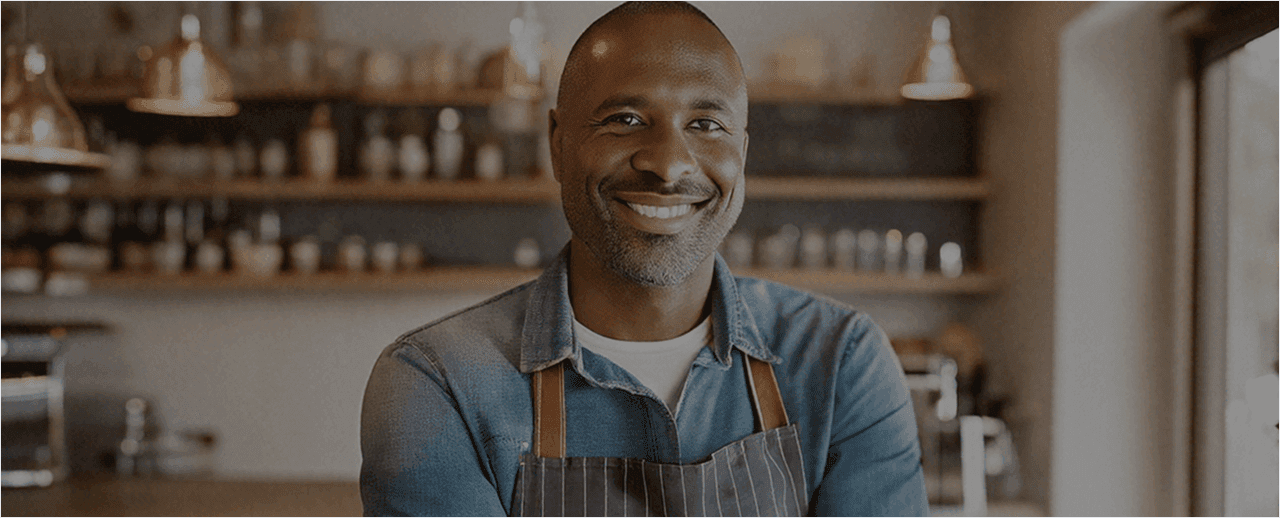 Smiling chef in an apron